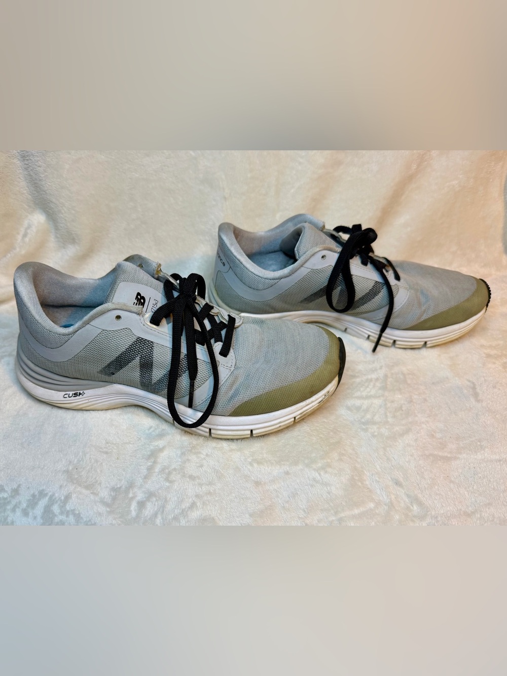 New Balance Women's Athletic Sneakers in Gray and White with Black Laces